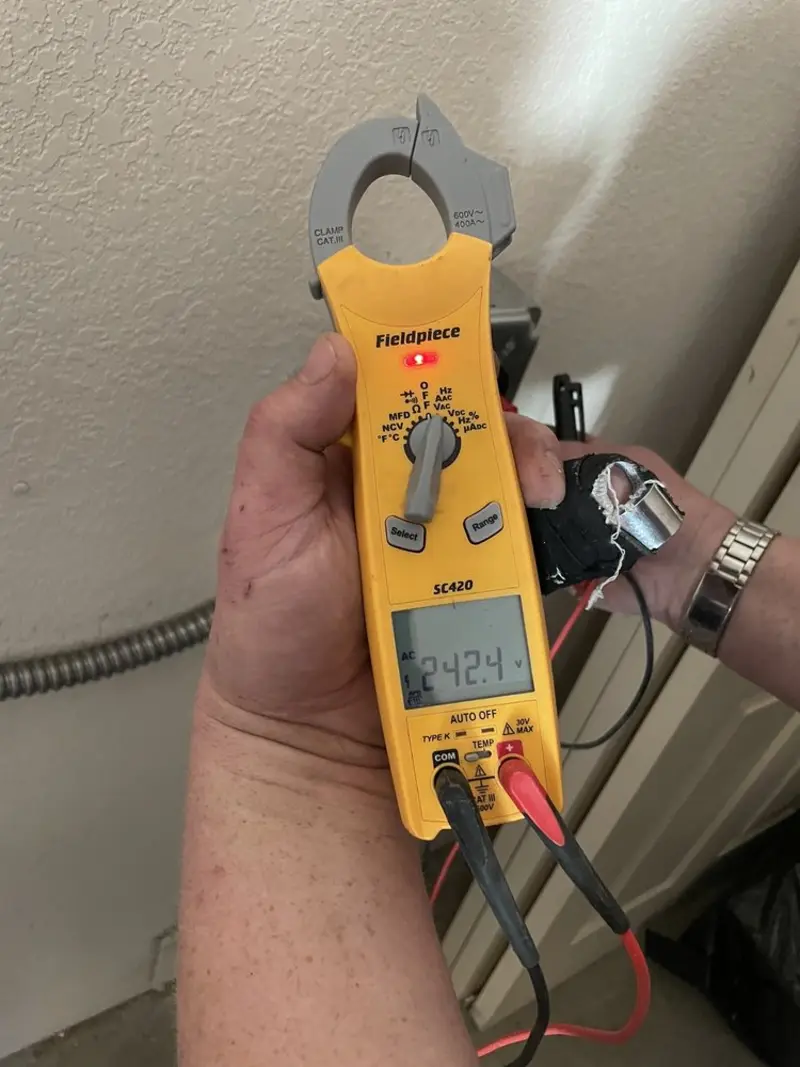 Voltage testing with clamp meter during Generator Installation in La Habra Heights